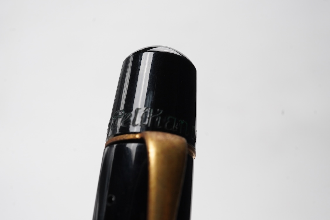 A Pelikan 100N fountain pen fitted with a 14ct. gold Pelkan nib